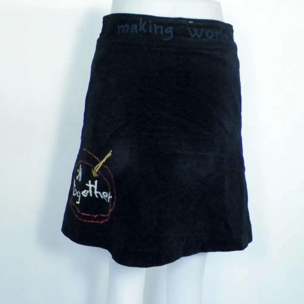 Jupe Noire DESIGUAL T 36.